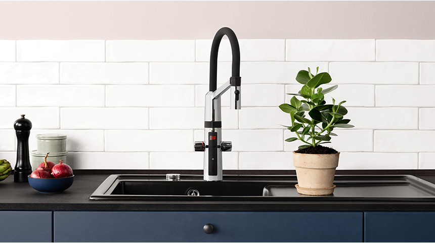 Kitchen faucet with high, movable spout can be handy in washing large pots and pans.