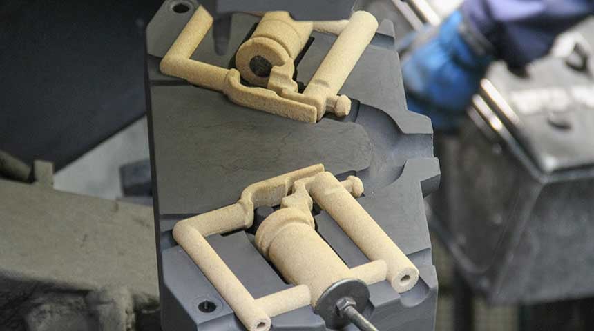 The cores are placed inside the faucet mould.