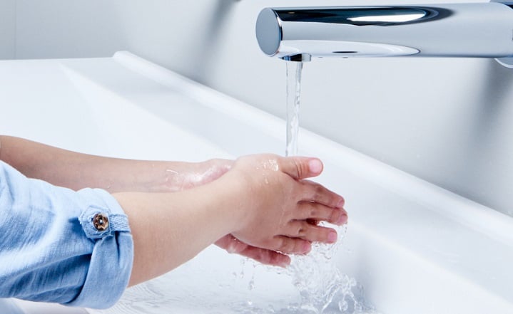 Hand washing with touchless faucet