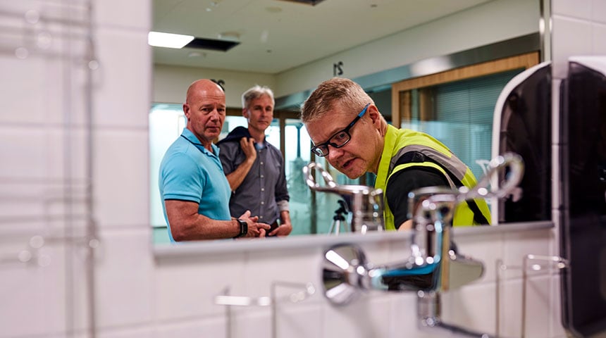 Hospital's HVAC supervisor Mika Eloranta from Haahtela Oy gave a tour to Oras sales representative Juhani Karhula and country manager Marko Sundholm